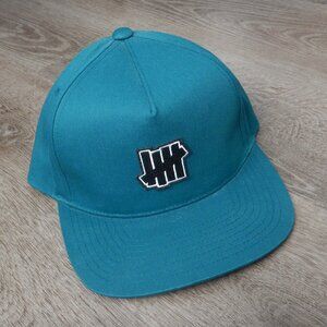 SAMPLE Undefeated Turquoise Five Strikes Logo Snapback Hat
